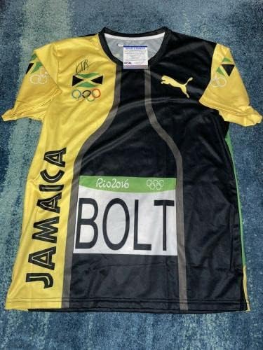 Usain Bolt חתום על פומה ריו אולימפיאדה ג'רזי מדליית זהב 8x ג'מייקה זהב PSA/DNA 7 - גופיות אולימפיות עם חתימה